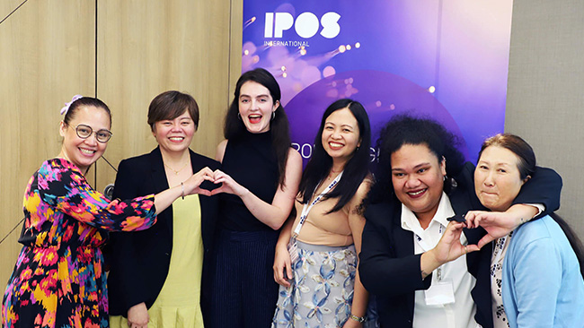 Programme coordinators Ms Dilpreet Kaur and Ms Yeo Li Sung (IPOS International) with beaming participants, marking the completion of their transformative journey in AI and data governance.
