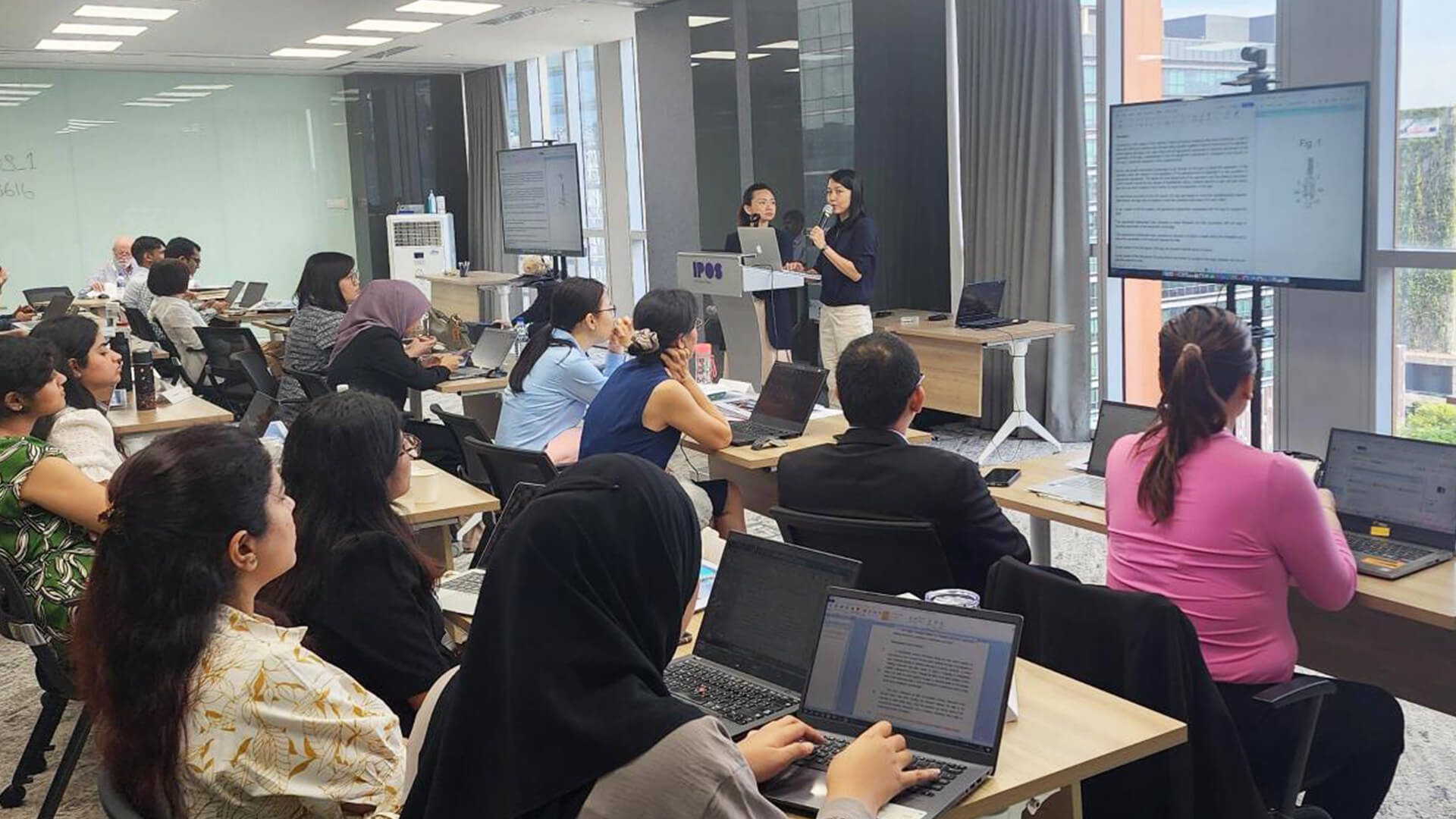 Participants presenting their group projects, sparking lively discussions and collective problem-solving during this interactive session